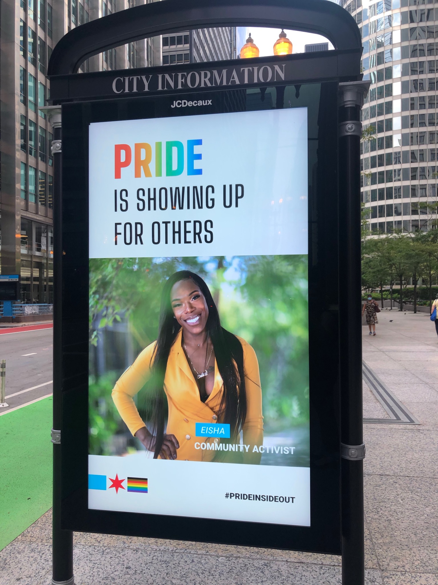 Chicago city information billboard featuring Eisha Love during Pride Month